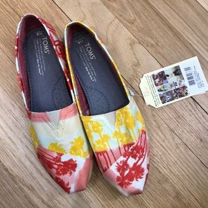 Brand new Toms slip ons